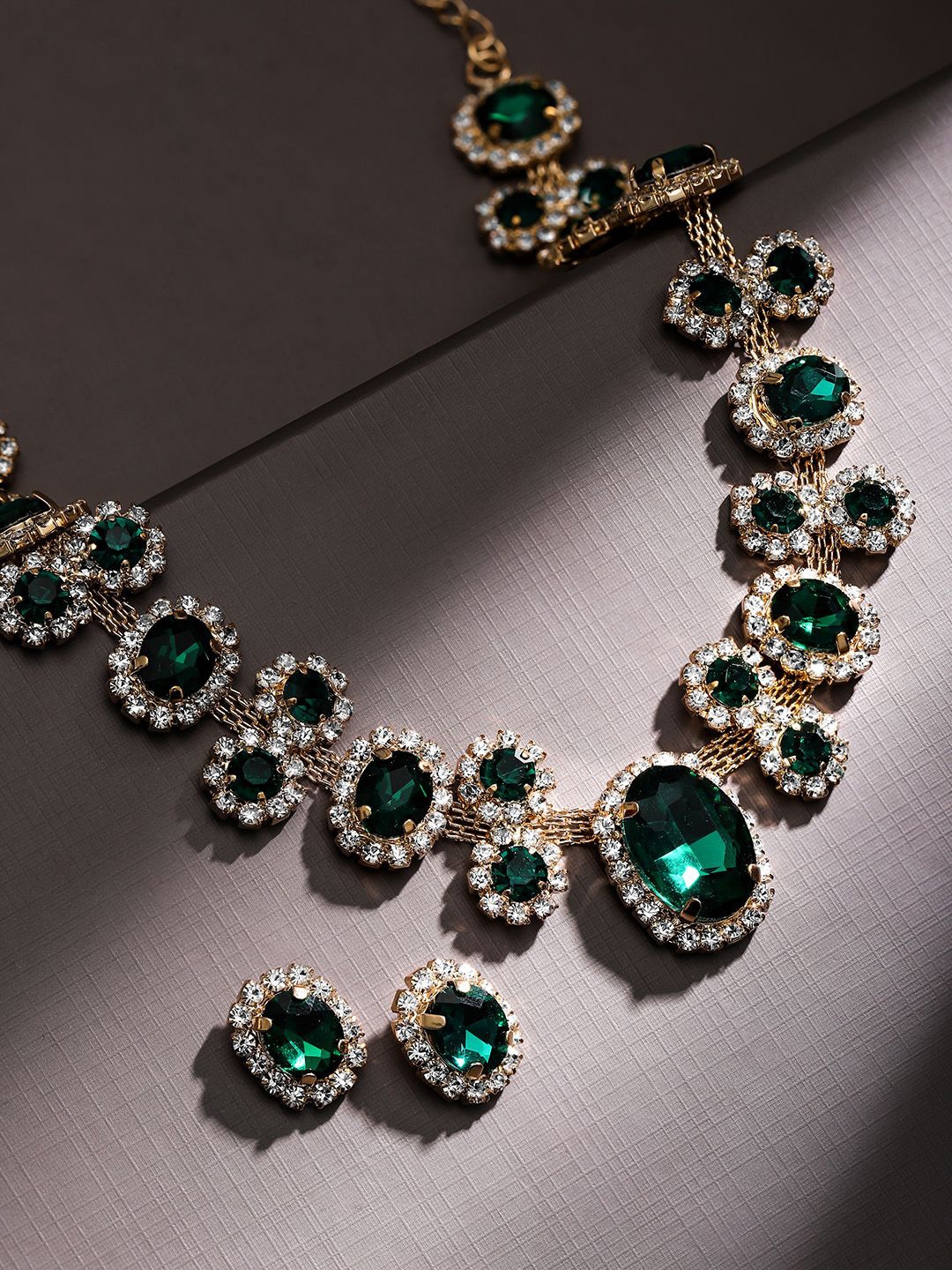 Rubans Voguish 18K Gold Plated Emerald Green Crystal & Cubic Zirconia Studded Necklace Set
Rubans Voguish 18K Gold Plated Emerald Green Crystal & Cubic Zirconia Studded Necklace Set