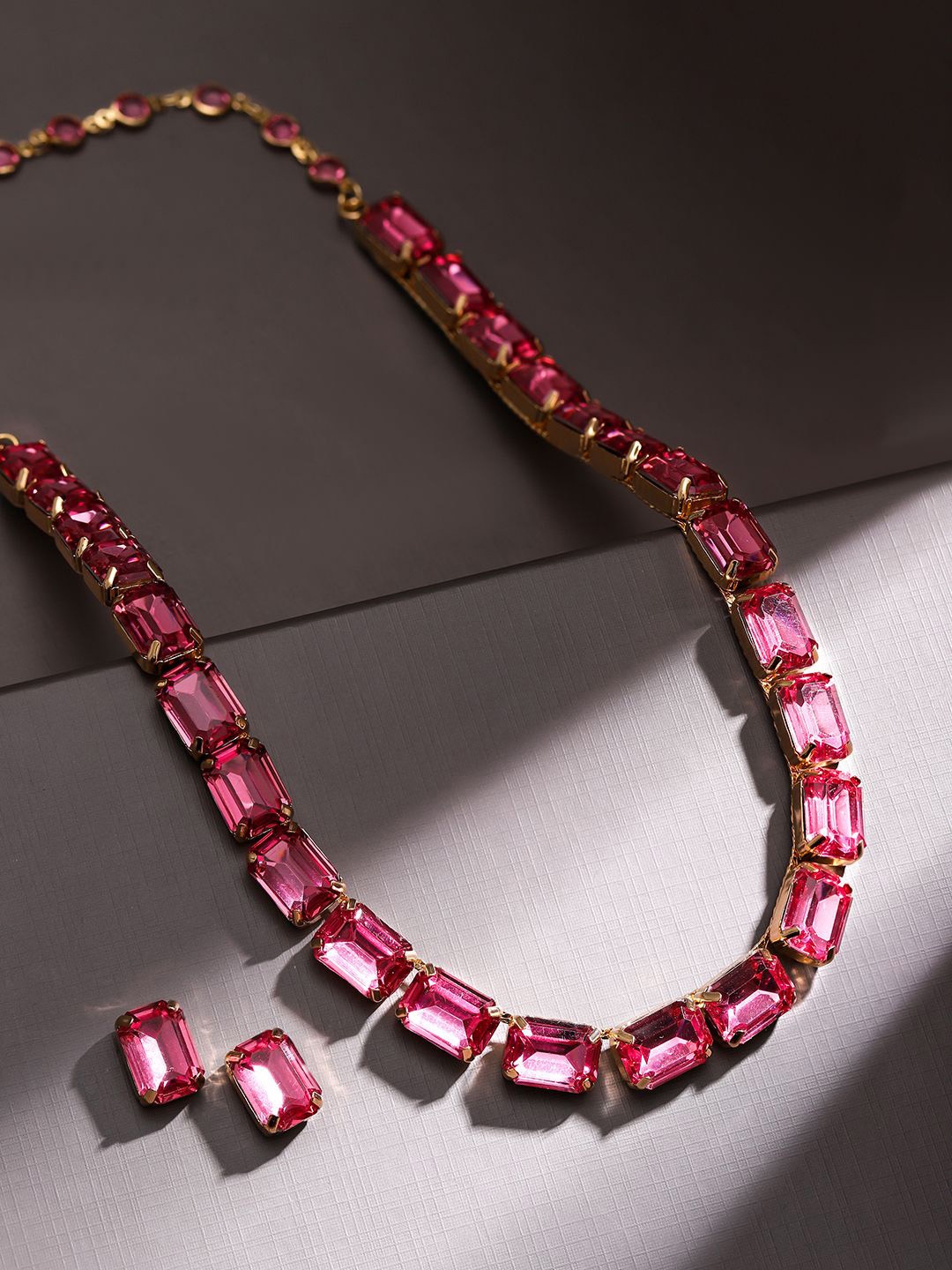 Rubans Voguish 18K Gold Plated Crystal Pink Cubic Zirconia Studded Statement Necklace Set
Rubans Voguish 18K Gold Plated Crystal Pink Cubic Zirconia Studded Statement Necklace Set