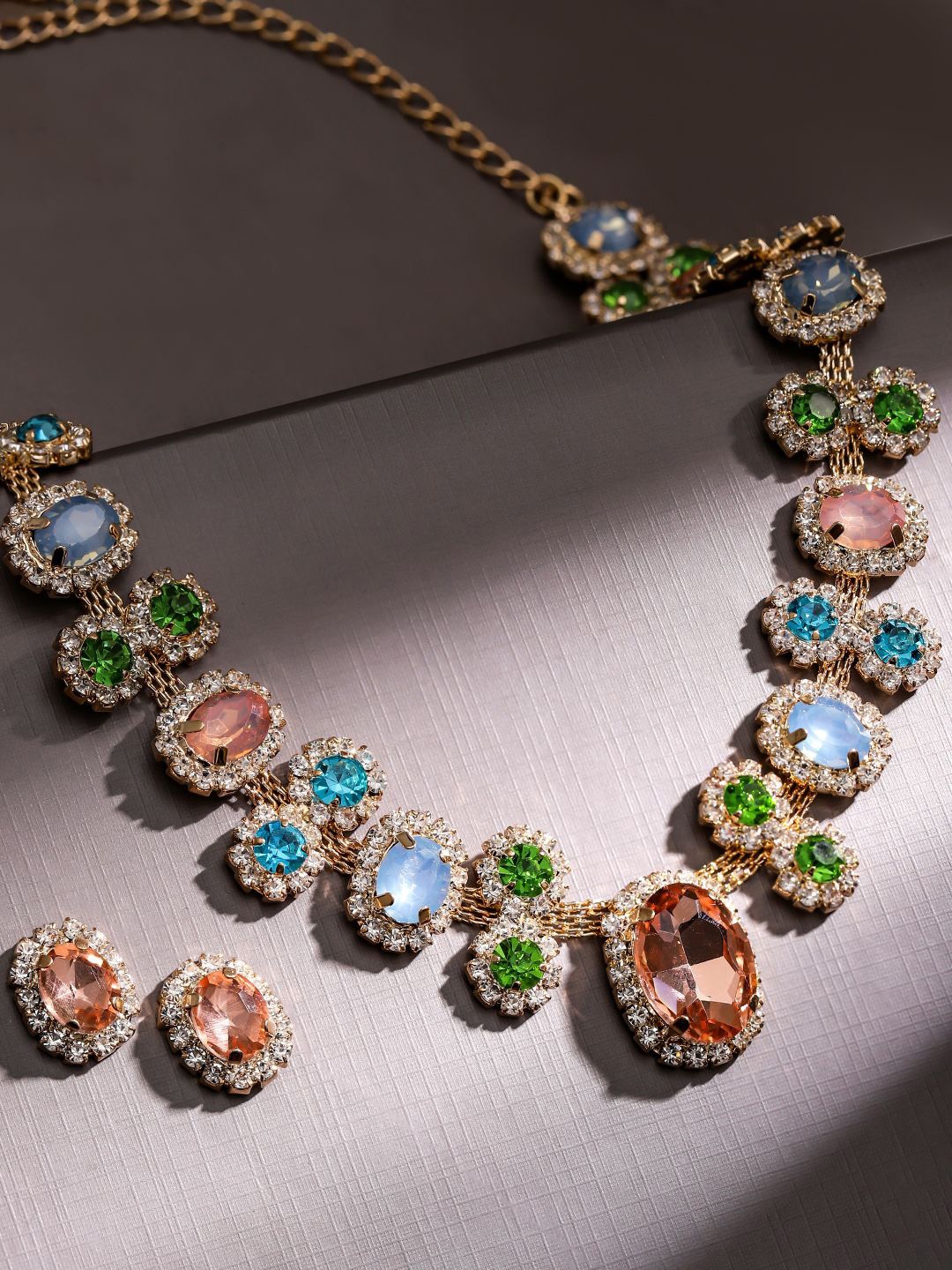 Rubans Voguish 18K Gold Plated Multicolor Crystal & Cubic Zirconia Statement Necklace Set
Rubans Voguish 18K Gold Plated Multicolor Crystal & Cubic Zirconia Statement Necklace Set