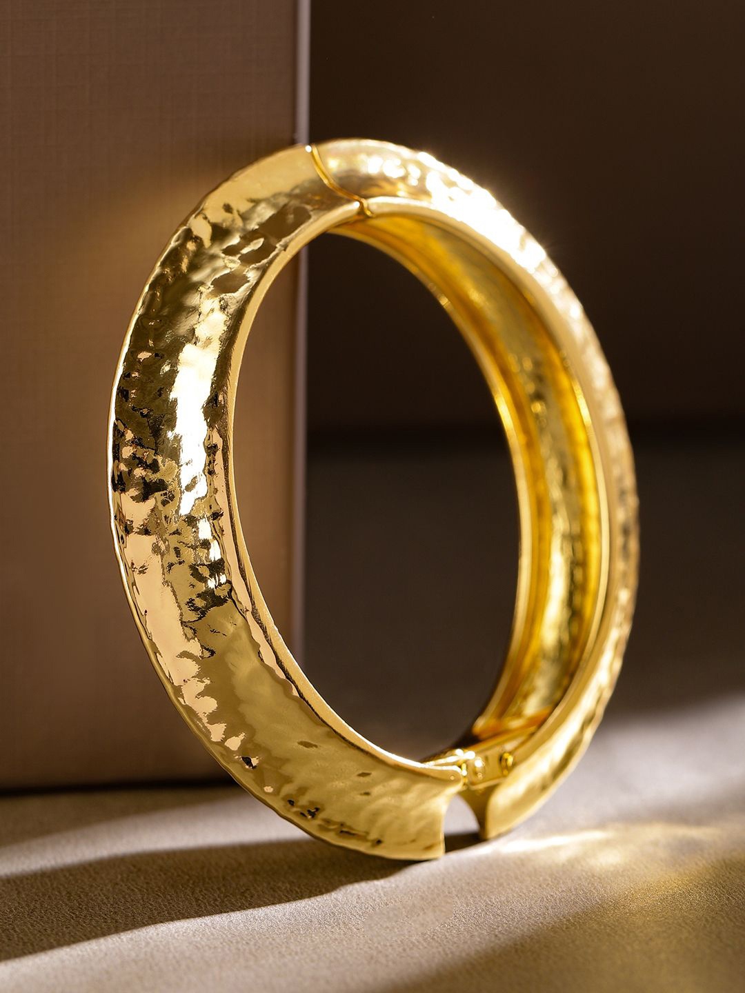 Rubans 18K Gold Plated Hammered Texture Openable Bangle Bracelet for a Bold Statement Look
Rubans 18K Gold Plated Hammered Texture Openable Bangle Bracelet for a Bold Statement Look