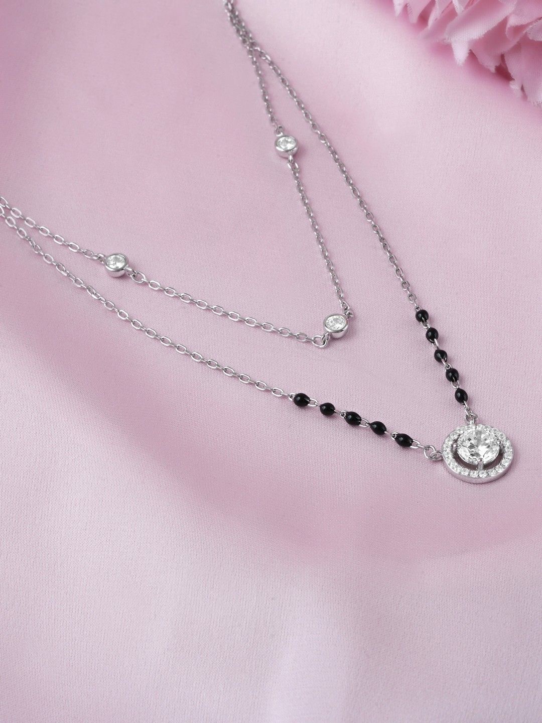 Zavya 925 Sterling Silver Rhodium-Plated Artificial Stones Studded & Beaded Mangalsutra
Zavya 925 Sterling Silver Rhodium-Plated Artificial Stones Studded & Beaded Mangalsutra