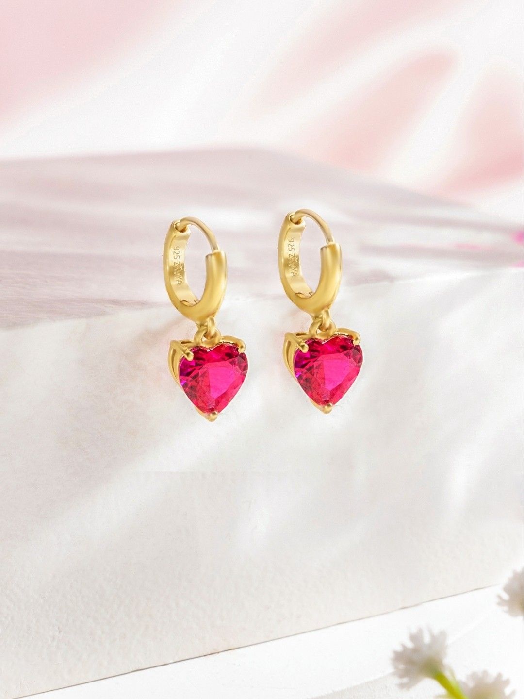 Zavya 92.5 Sterling Silver Gold-Plated Cubic Zirconia Heart Shaped Drop Earrings
Zavya 92.5 Sterling Silver Gold-Plated Cubic Zirconia Heart Shaped Drop Earrings