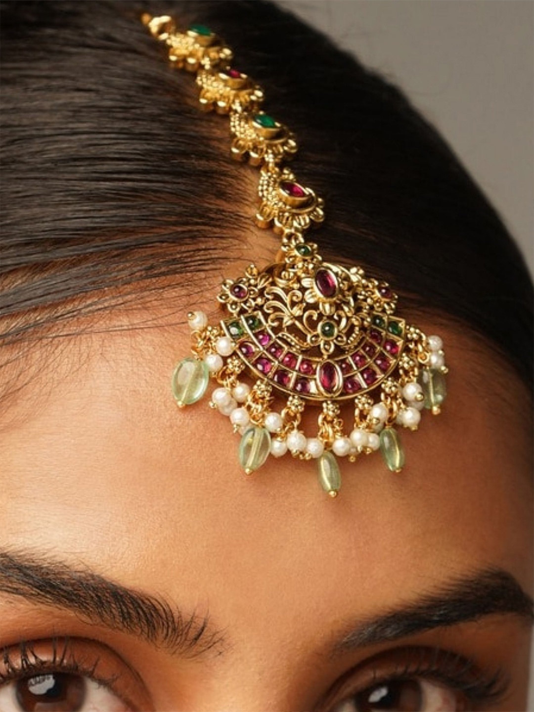 ABDESIGNS Gold-Plated Artificial Stones and Beads Studded Maang Tikka Head Jewellery
ABDESIGNS Gold-Plated Artificial Stones and Beads Studded Maang Tikka Head Jewellery