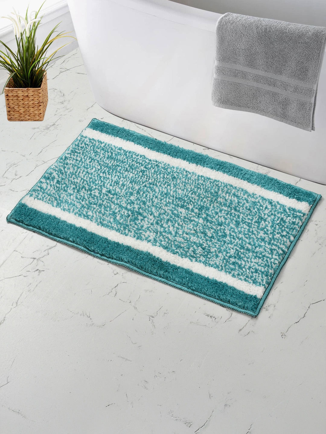 MAA HOME CONCEPT Turquoise Blue & White Textured Microfiber Anti Skid 1600 GSMBathMat
MAA HOME CONCEPT Turquoise Blue & White Textured Microfiber Anti Skid 1600 GSMBathMat