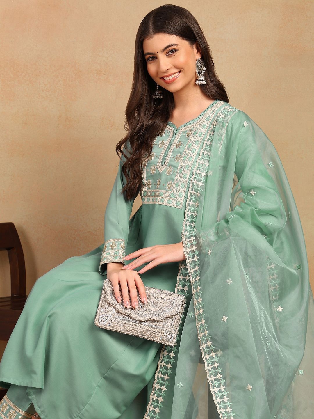 House of Pataudi Women Solid Embroidered A-Line Kurta With Trousers & Dupatta, Sea green
House of Pataudi Women Solid Embroidered A-Line Kurta With Trousers & Dupatta, Sea green