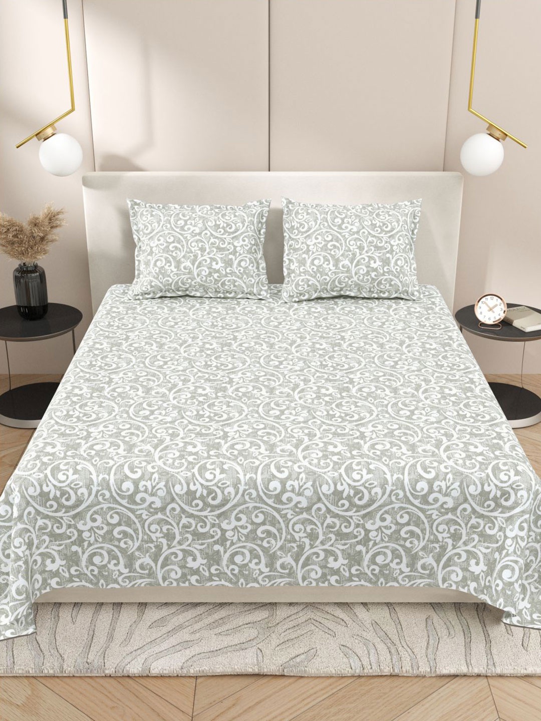 Myntra Elegant Homes Grey & Pink Ethnic Motifs 220 TC King Bedsheet with 2 Pillow Covers
Myntra Elegant Homes Grey & Pink Ethnic Motifs 220 TC King Bedsheet with 2 Pillow Covers
