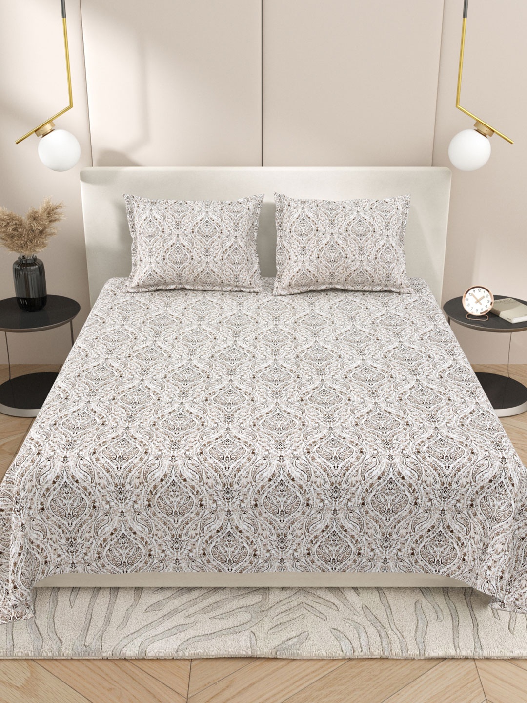 Myntra Elegant Homes White & Brown Ethnic Motifs 220 TC King Bedsheet with 2 Pillow Covers
Myntra Elegant Homes White & Brown Ethnic Motifs 220 TC King Bedsheet with 2 Pillow Covers