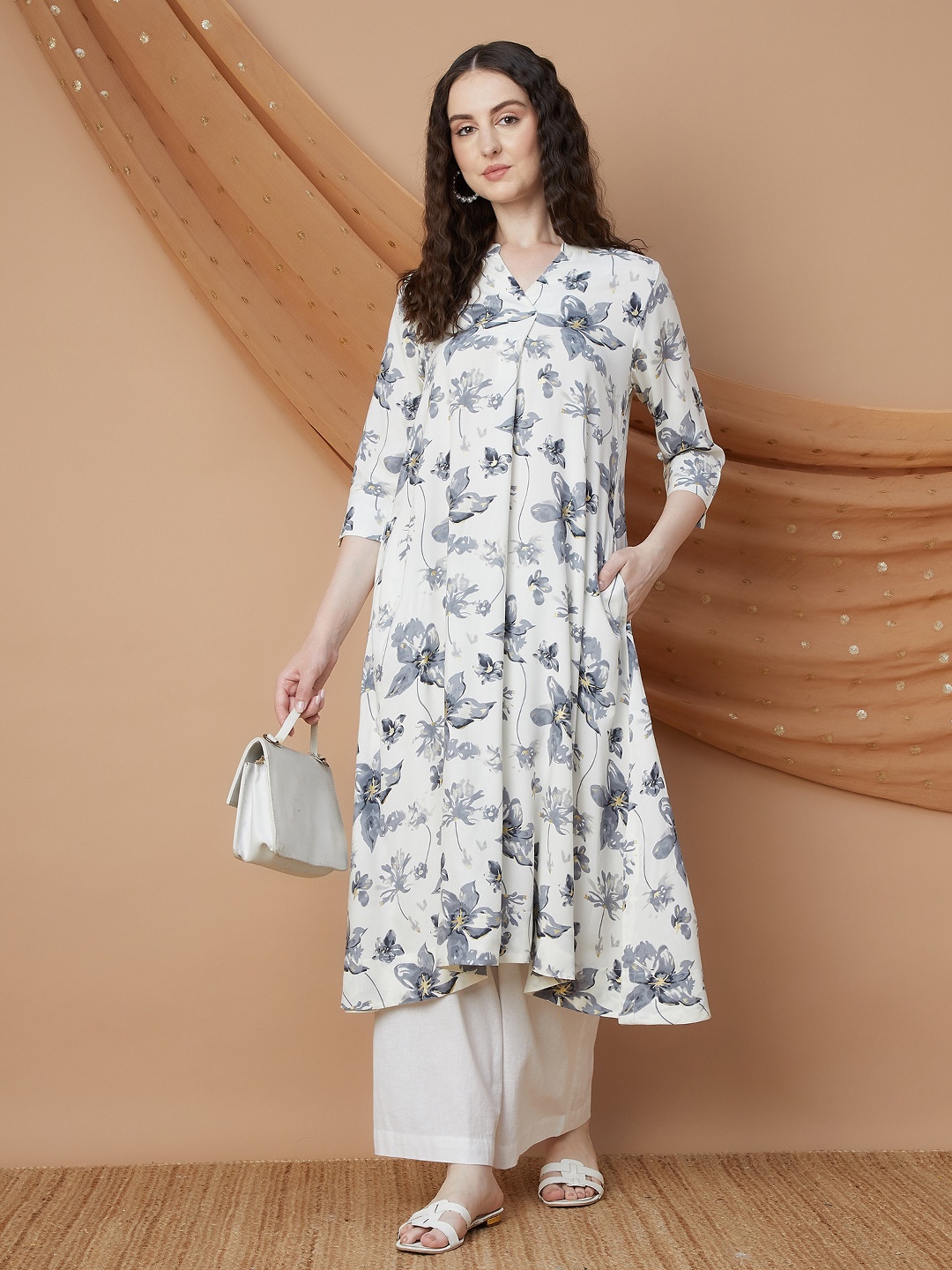 Melange by Lifestyle Floral Printed Mandarin Collar Thread Work A-Line Kurta, Off white
Melange by Lifestyle Floral Printed Mandarin Collar Thread Work A-Line Kurta, Off white