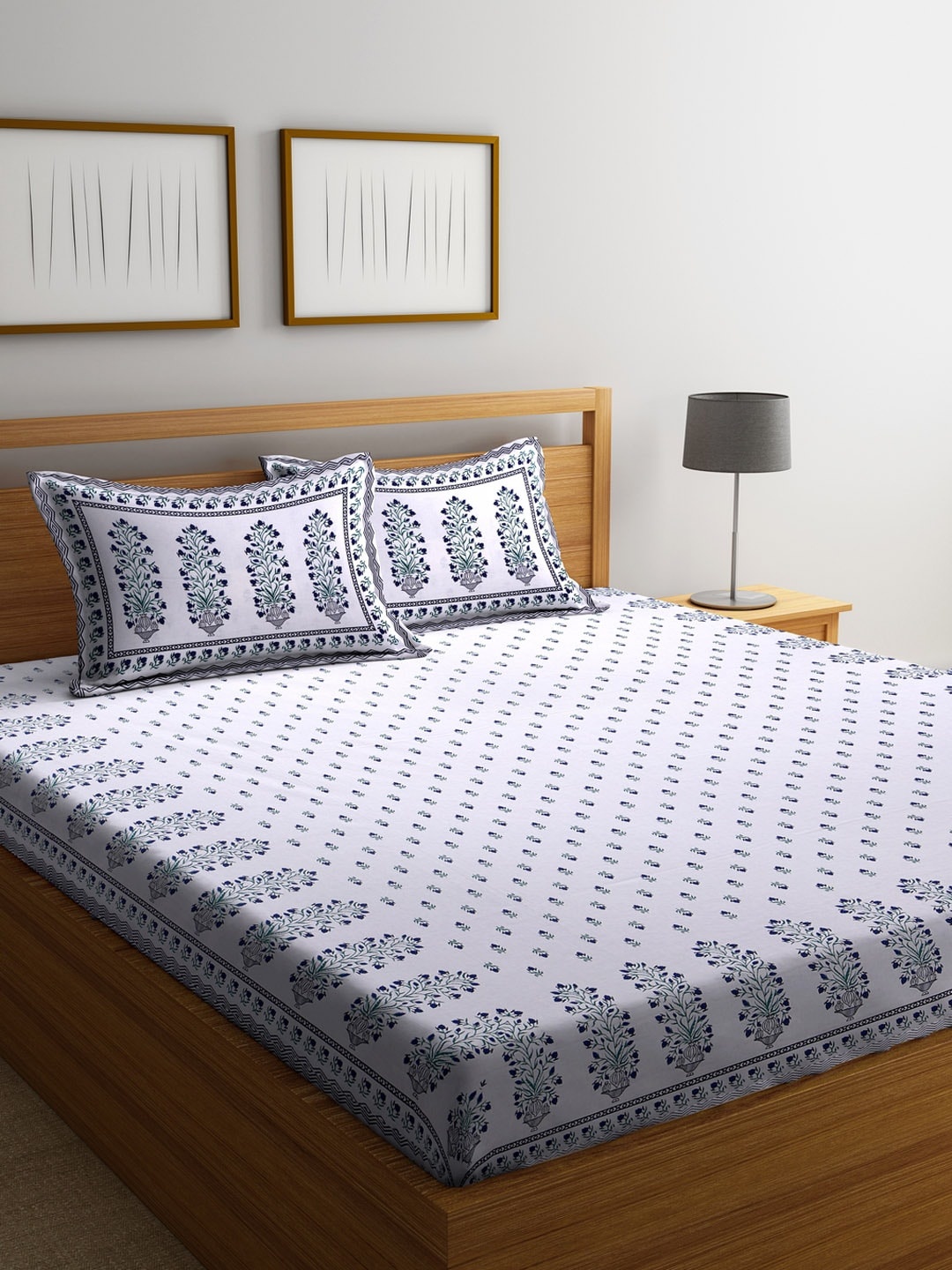 Rajasthan Decor White & Navy Blue Ethnic Motifs Flat 180 TC Cotton 1 King Bedsheet with 2 Pillow Covers
Rajasthan Decor White & Navy Blue Ethnic Motifs Flat 180 TC Cotton 1 King Bedsheet with 2 Pillow Covers