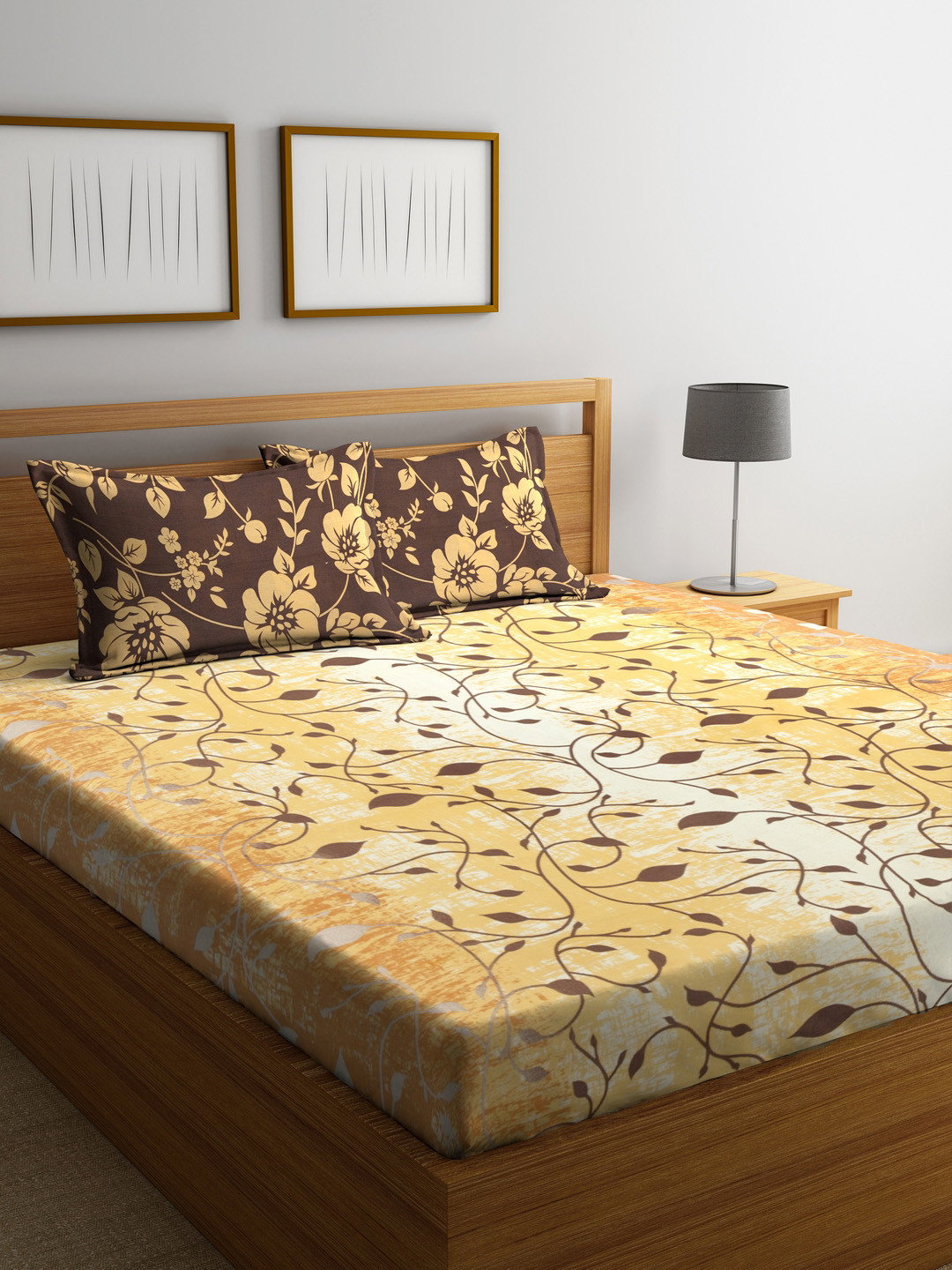 Cortina Yellow & Brown Ethnic Motifs Flat 120 TC Cotton 1 Queen Bedsheet with 2 Pillow Covers 
Cortina Yellow & Brown Ethnic Motifs Flat 120 TC Cotton 1 Queen Bedsheet with 2 Pillow Covers