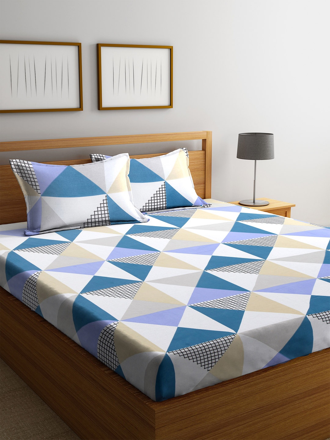 Cortina Off-White & Blue Geometric Flat 120 TC Cotton 1 Queen Bedsheet with 2 Pillow Covers
Cortina Off-White & Blue Geometric Flat 120 TC Cotton 1 Queen Bedsheet with 2 Pillow Covers