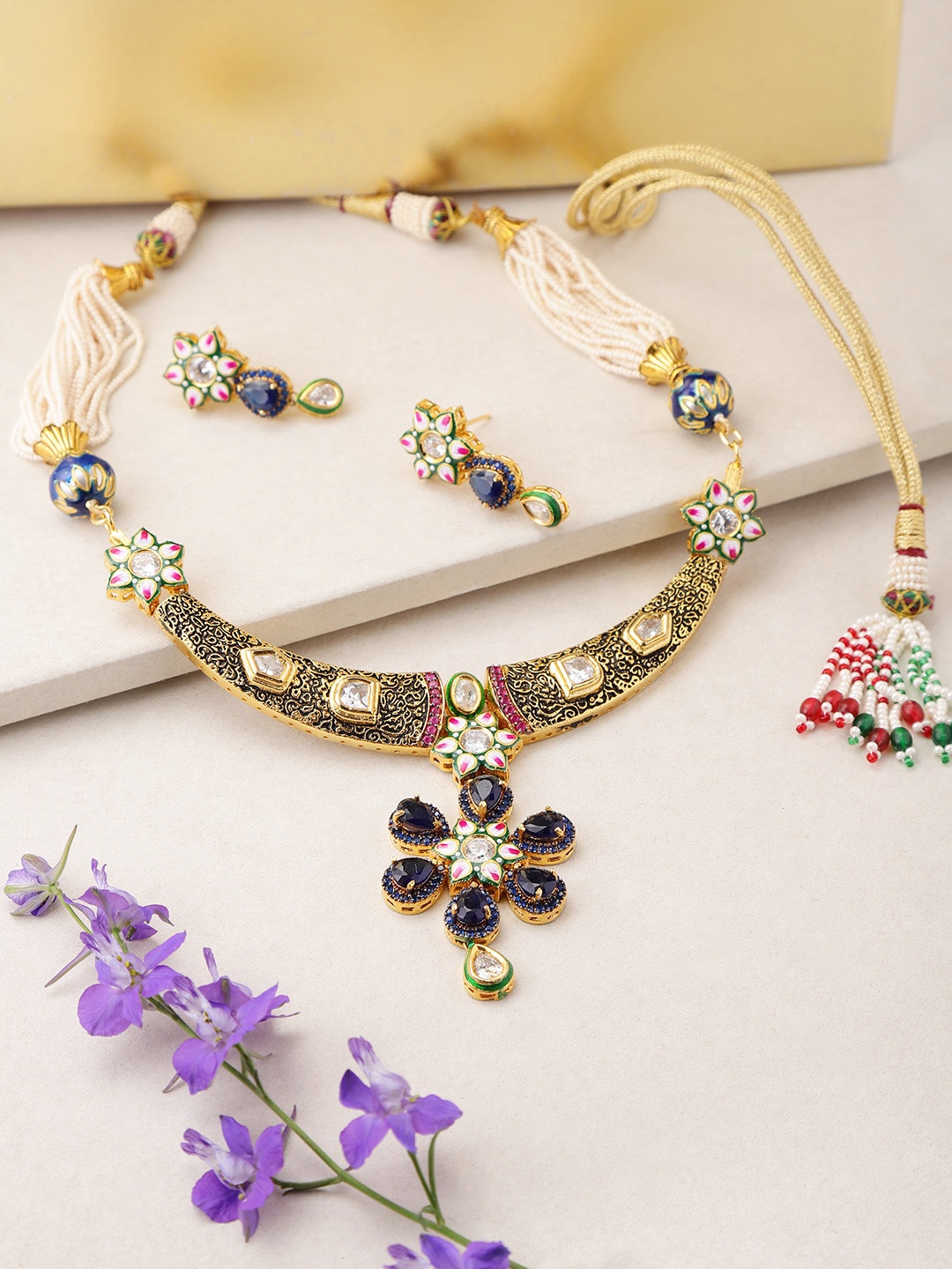 Melani Borsa Navy Blue Gold-Plated Stone-Studded Handcrafted Meenakari Jewellery Set
Melani Borsa Navy Blue Gold-Plated Stone-Studded Handcrafted Meenakari Jewellery Set
