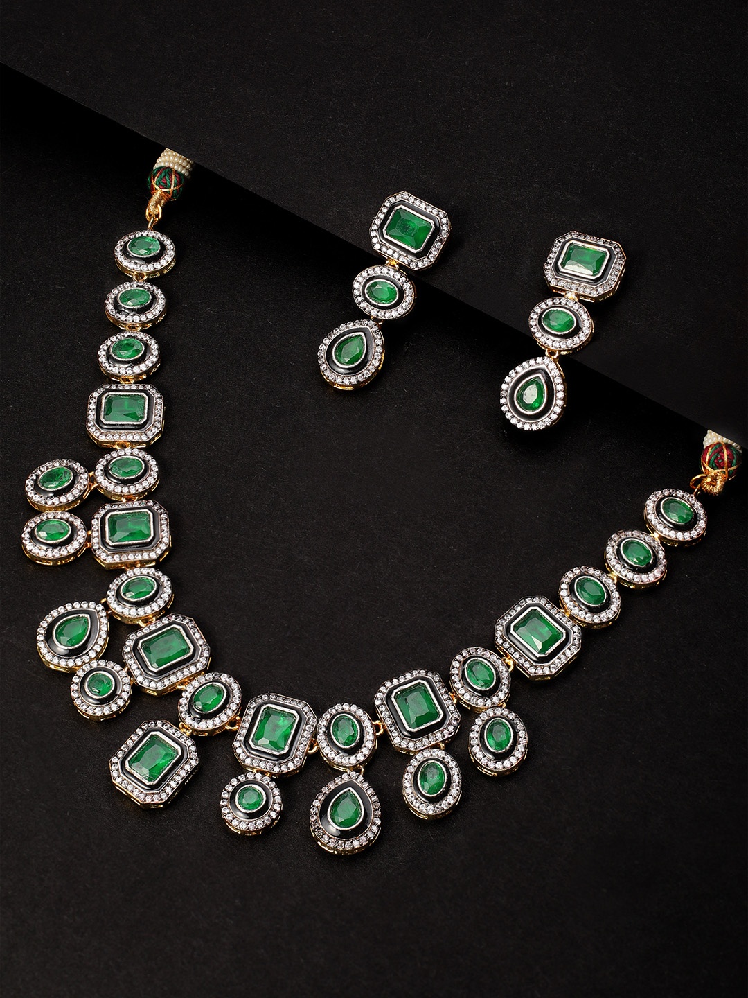 Rubans Women Gold-Plated, Black & Green CZ Studded Faux Emerald Embellished Jewellery Set
Rubans Women Gold-Plated, Black & Green CZ Studded Faux Emerald Embellished Jewellery Set