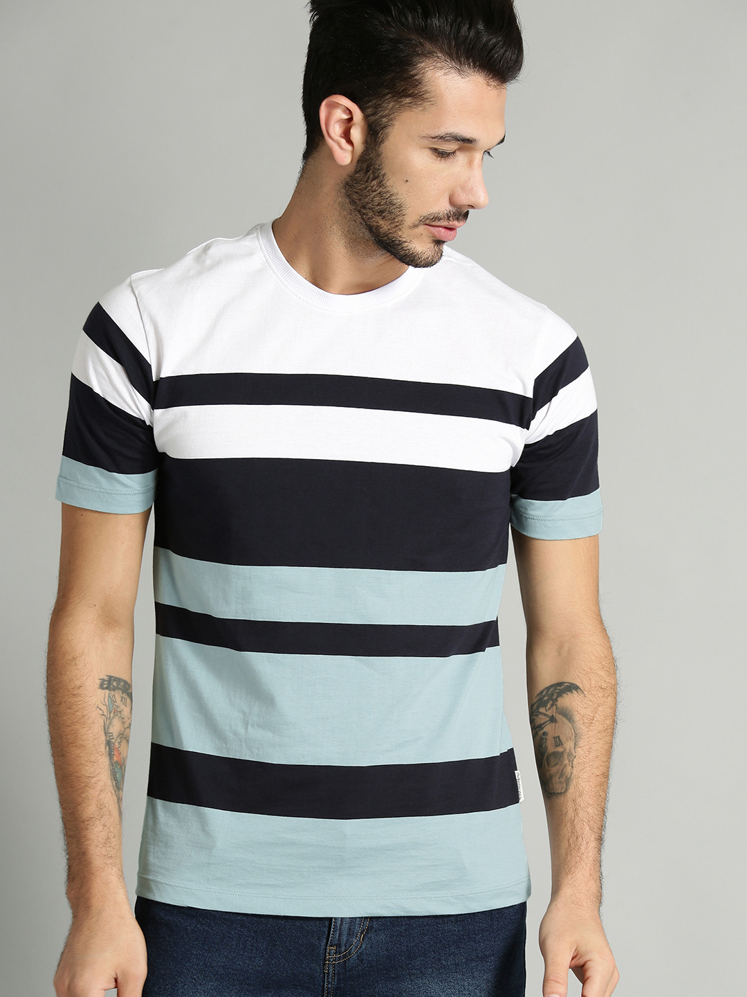 The Roadster Lifestyle Co Men Blue & White Striped Round Neck T-shirt 
The Roadster Lifestyle Co Men Blue & White Striped Round Neck T-shirt