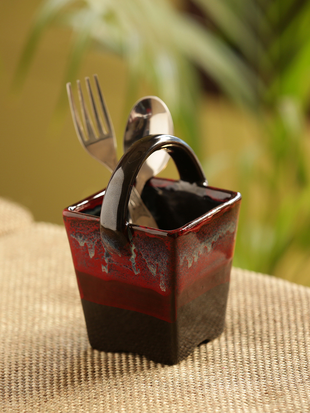 ExclusiveLane Maroon Bucket of Lava Hand Glazed Studio Pottery Ceramic Cutlery Holder
ExclusiveLane Maroon Bucket of Lava Hand Glazed Studio Pottery Ceramic Cutlery Holder