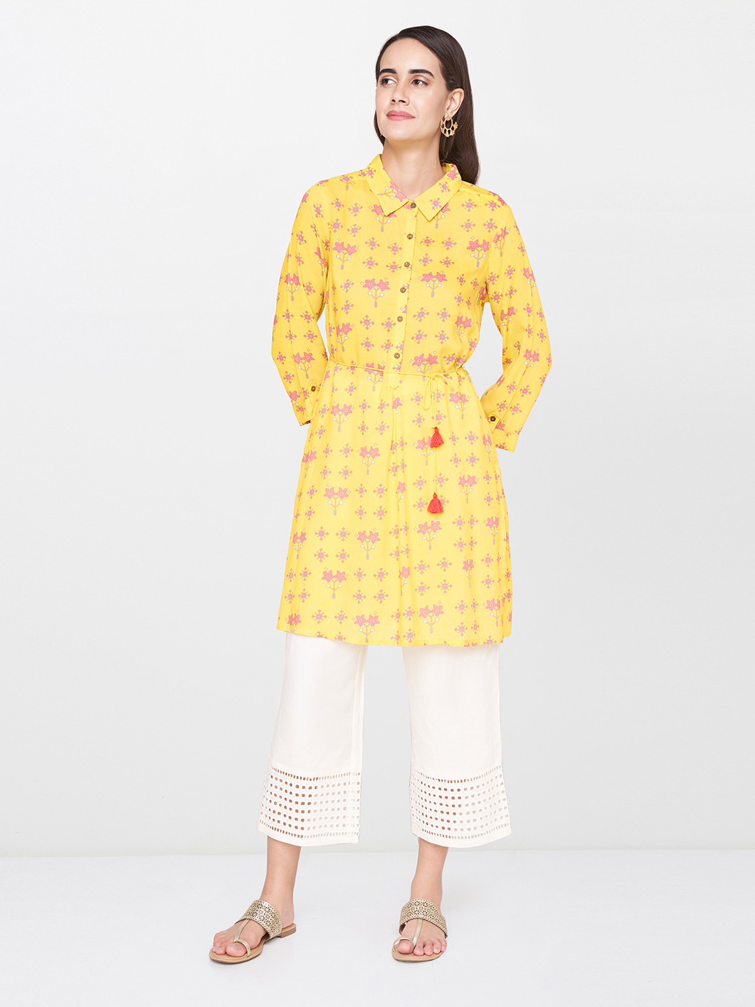Global Desi Women Yellow Printed Tunic 
Global Desi Women Yellow Printed Tunic