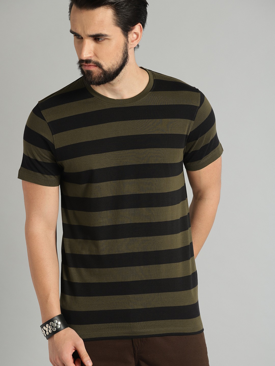 The Roadster Lifestyle Co Men Olive Green Black Striped Round Neck Pure Cotton T-shirt
The Roadster Lifestyle Co Men Olive Green Black Striped Round Neck Pure Cotton T-shirt