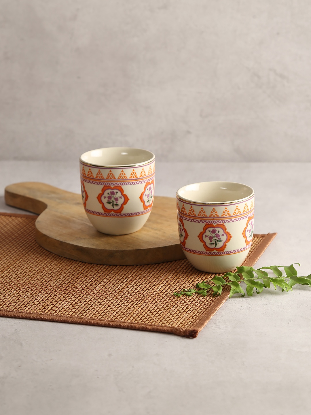 India Circus by Krsnaa Mehta Cream-Coloured & Orange 2-Pieces Printed Ceramic Kulladhs Set
India Circus by Krsnaa Mehta Cream-Coloured & Orange 2-Pieces Printed Ceramic Kulladhs Set