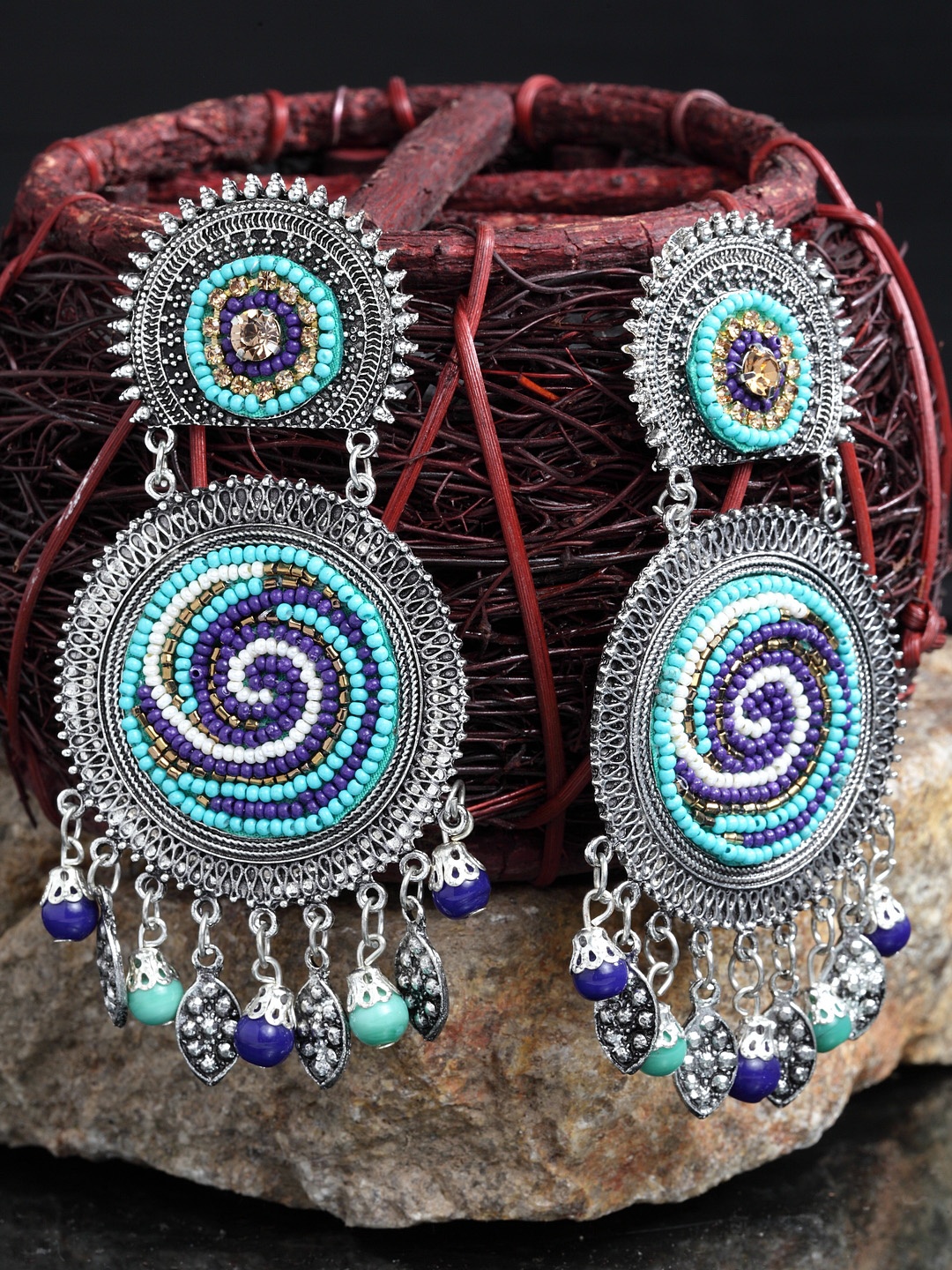 Moedbuille Silver-Toned & Turquoise Blue German Silver Handcrafted Circular Drop Earrings
Moedbuille Silver-Toned & Turquoise Blue German Silver Handcrafted Circular Drop Earrings
