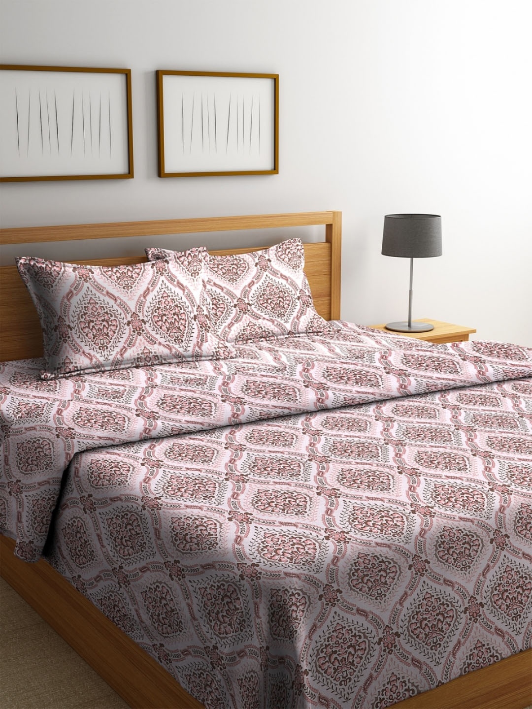 ROMEE Pink & Brown Printed Reversible AC Comforter with Bedsheet and 2 Pillow Covers
ROMEE Pink & Brown Printed Reversible AC Comforter with Bedsheet and 2 Pillow Covers