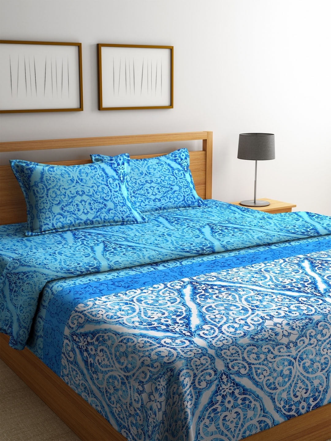 ROMEE Blue & White Printed Reversible AC Comforter with Bedsheet and 2 Pillow Covers
ROMEE Blue & White Printed Reversible AC Comforter with Bedsheet and 2 Pillow Covers