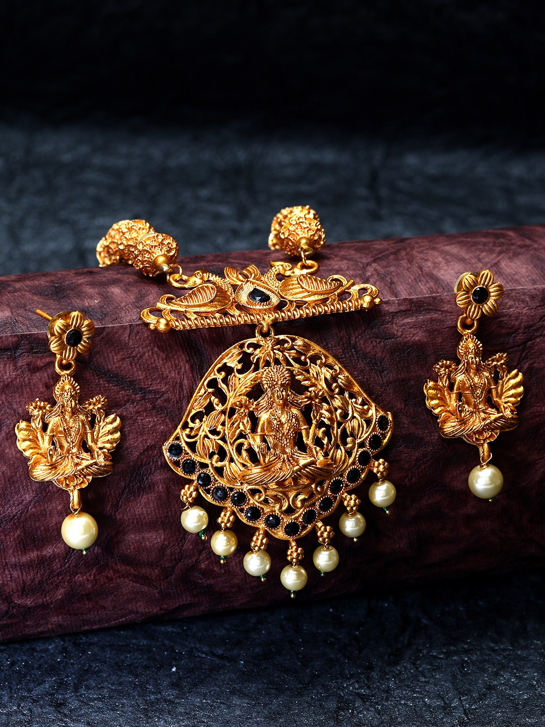 ANIKAS CREATION Gold-Plated & Black Stone-Studded Maa Laxmi Temple Jewellery Set
ANIKAS CREATION Gold-Plated & Black Stone-Studded Maa Laxmi Temple Jewellery Set