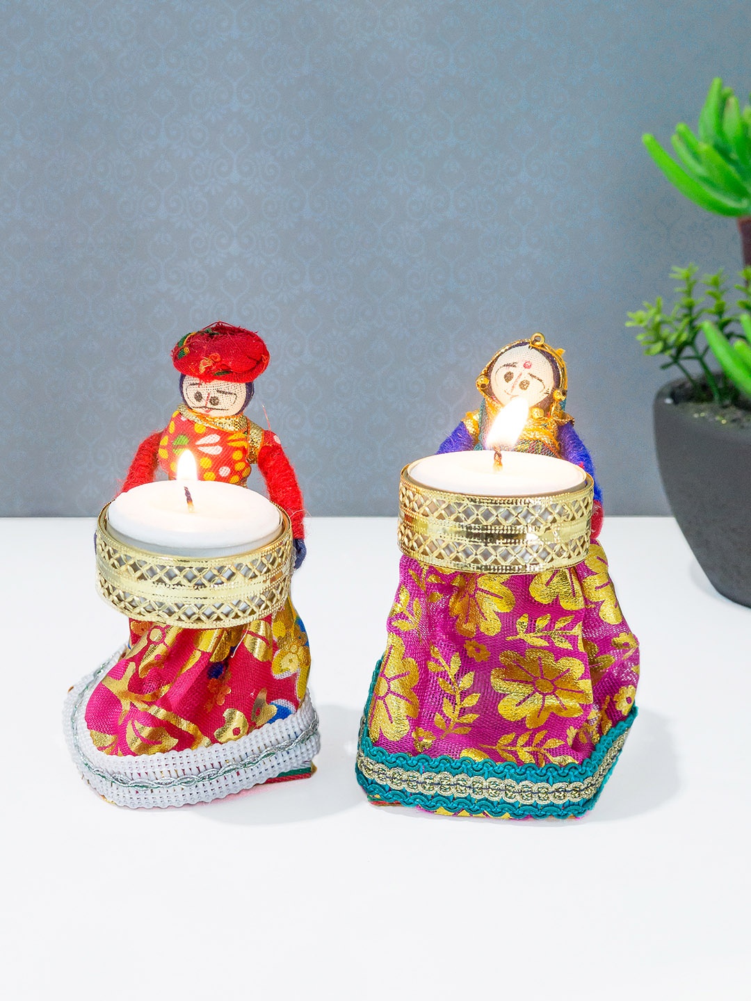 Golden Peacock Set of 2 Gold-Toned & Red Handcrafted Wooden Puppet Candle Holder Showpiece
Golden Peacock Set of 2 Gold-Toned & Red Handcrafted Wooden Puppet Candle Holder Showpiece