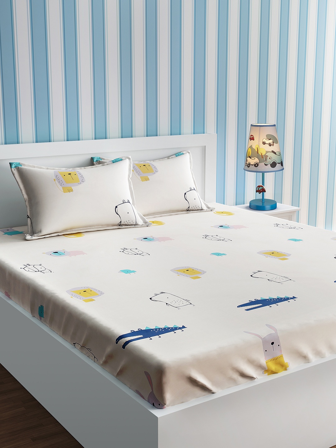 URBAN DREAM Off-White & Yellow Cartoon Characters 210 TC Cotton 1 Queen Bedsheet with 2 Pillow Covers
URBAN DREAM Off-White & Yellow Cartoon Characters 210 TC Cotton 1 Queen Bedsheet with 2 Pillow Covers