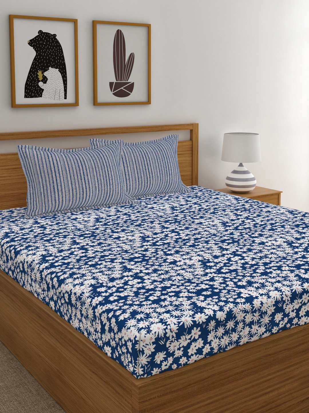 MYTRIDENT Blue White Floral 120 TC Cotton 1 Queen Bedsheet with 2 Pillow Covers
MYTRIDENT Blue White Floral 120 TC Cotton 1 Queen Bedsheet with 2 Pillow Covers