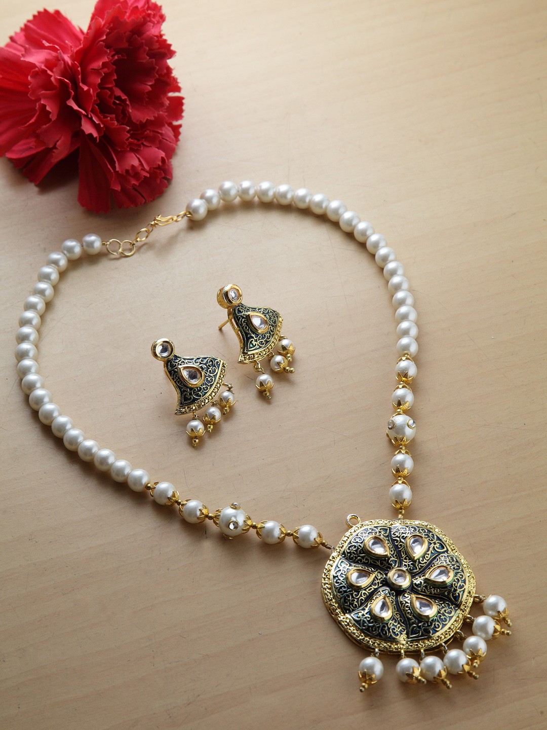 Moedbuille Blue Handcrafted Kundan Jadau Meenakari and Pearl Gold Plated Brass Jewelry Set
Moedbuille Blue Handcrafted Kundan Jadau Meenakari and Pearl Gold Plated Brass Jewelry Set