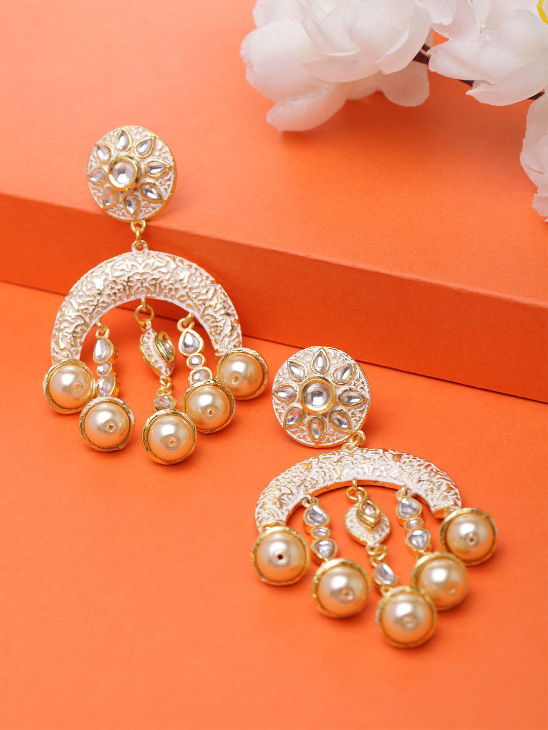 Moedbuille Gold-Plated & White Kundan and Pearls Studded Meenakari Drop Earrings
Moedbuille Gold-Plated & White Kundan and Pearls Studded Meenakari Drop Earrings