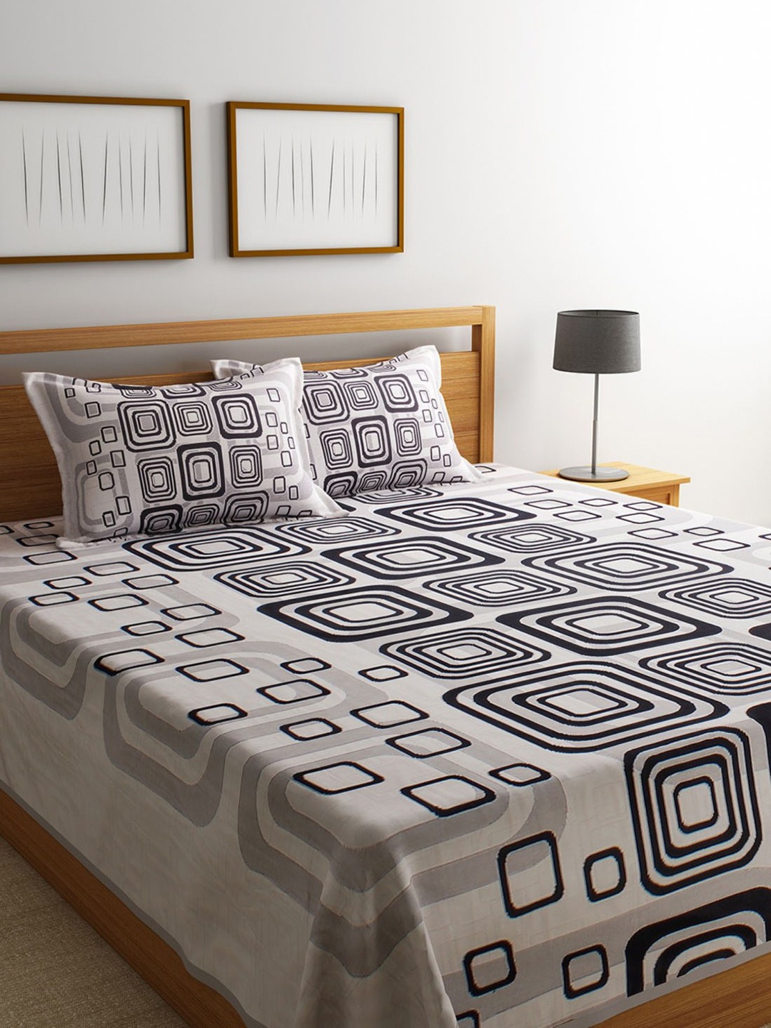 ROMEE Off White & Black Printed 180TC Reversible Double Bed Cover with 2 Pillow Covers
ROMEE Off White & Black Printed 180TC Reversible Double Bed Cover with 2 Pillow Covers