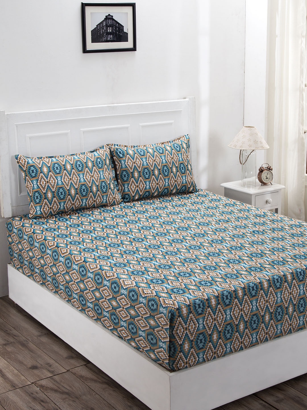 In-House by maspar Blue & Beige Abstract 144 TC Cotton 1 Queen Bedsheet with 2 Pillow Covers
In-House by maspar Blue & Beige Abstract 144 TC Cotton 1 Queen Bedsheet with 2 Pillow Covers