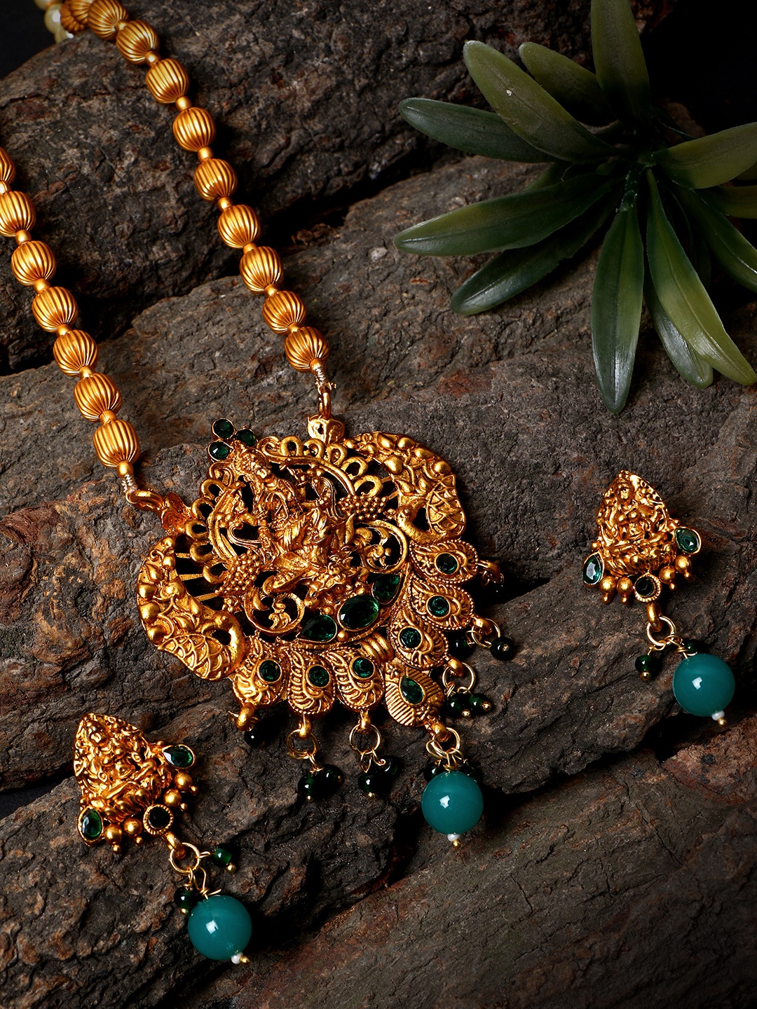 ANIKAS CREATION Women Gold-Plated & Green Antique Matte Finish Temple Jewellery Set
ANIKAS CREATION Women Gold-Plated & Green Antique Matte Finish Temple Jewellery Set