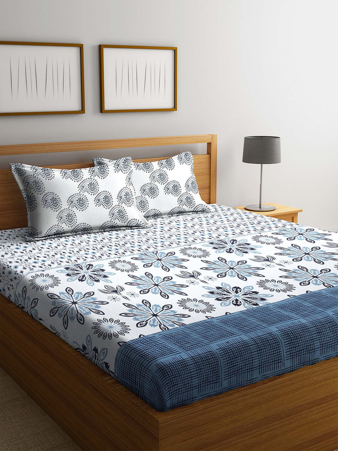 KLOTTHE White & Blue Ethnic Motifs 210 TC Cotton 1 King Bedsheet with 2 Pillow Covers 
KLOTTHE White & Blue Ethnic Motifs 210 TC Cotton 1 King Bedsheet with 2 Pillow Covers
