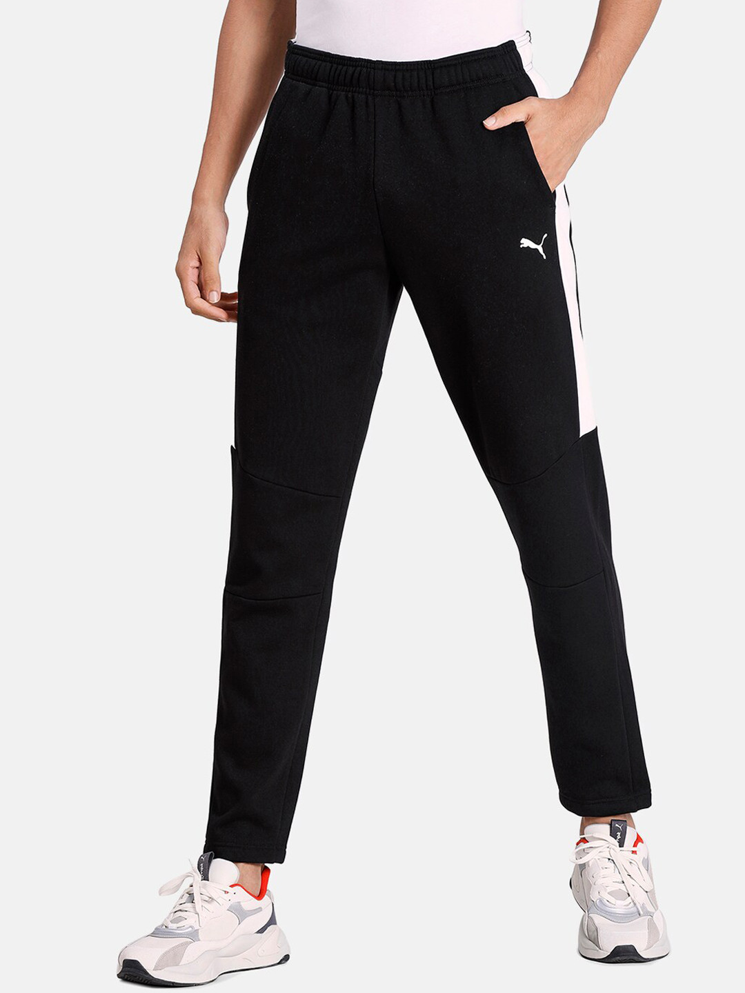 Puma Men Black & White Colourblocked FL Slim-Fit Mid-Rise Track Pants
Puma Men Black & White Colourblocked FL Slim-Fit Mid-Rise Track Pants