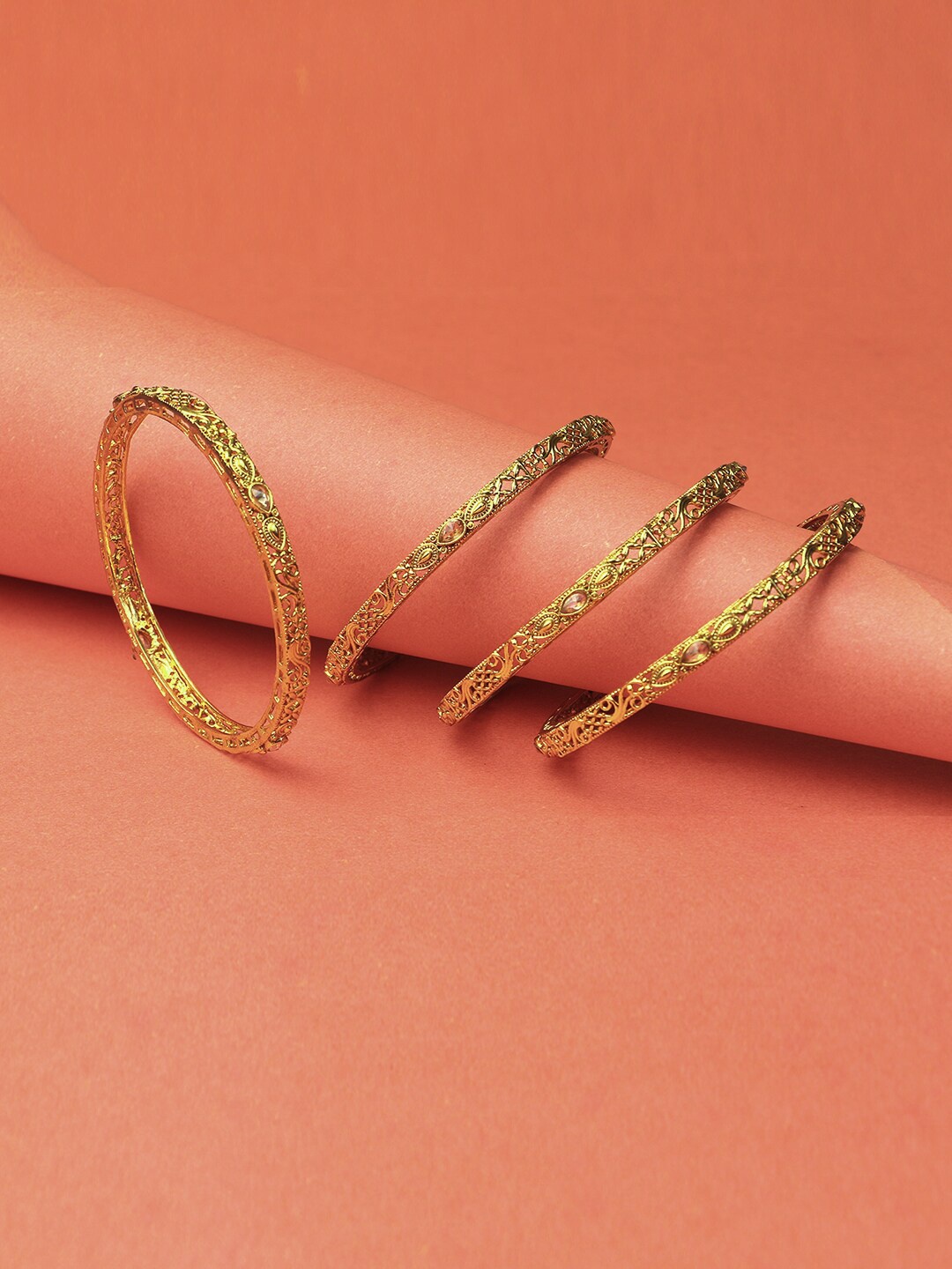 Adwitiya Collection Women Set of 4 24K Gold-Plated Stone-Studded Handcrafted Bangles
Adwitiya Collection Women Set of 4 24K Gold-Plated Stone-Studded Handcrafted Bangles