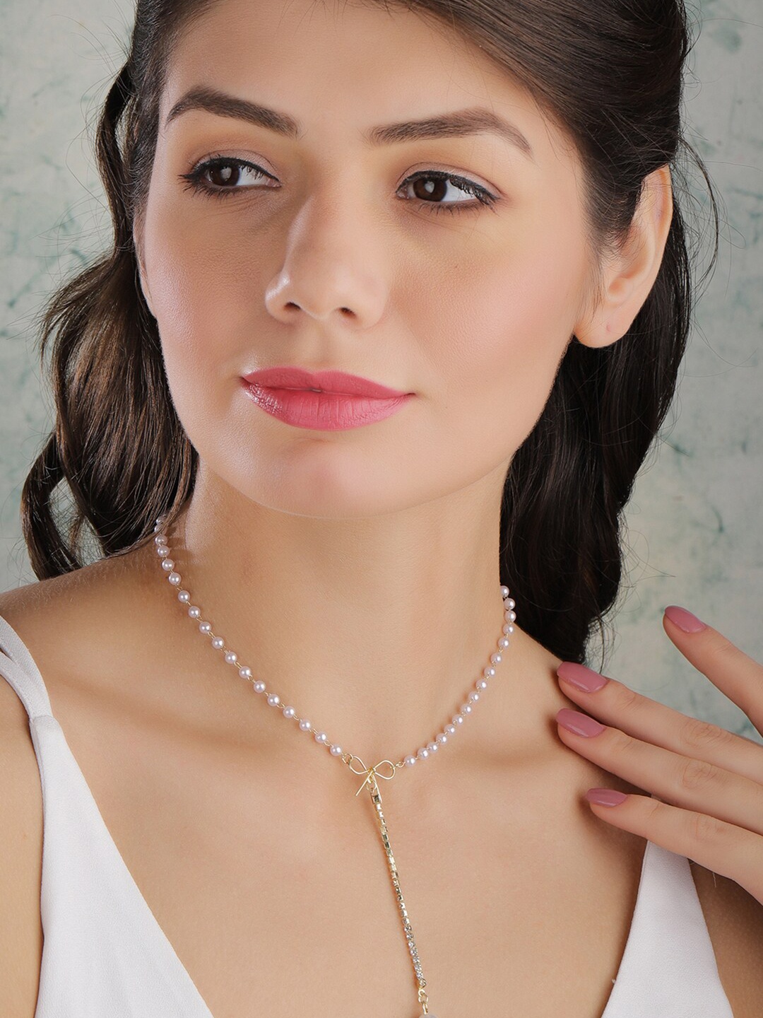 Tokyo Talkies X Rubans Gold Plated Handcrafted White Pearls & Stone Pendant with Chain
Tokyo Talkies X Rubans Gold Plated Handcrafted White Pearls & Stone Pendant with Chain