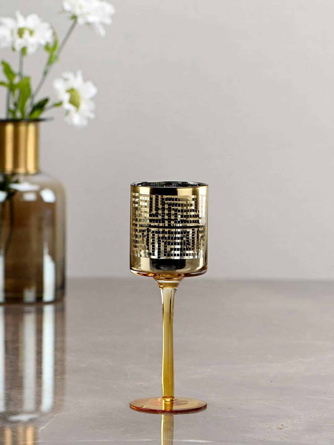 Pure Home and Living Gold-Toned Maze Pattern Stemmed Candle Holder
Pure Home and Living Gold-Toned Maze Pattern Stemmed Candle Holder