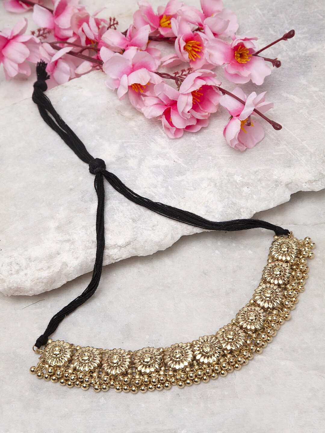 Moedbuille Gold-Plated Handcrafted Ghungroo Studded Antique Tribal Design Choker Necklace
Moedbuille Gold-Plated Handcrafted Ghungroo Studded Antique Tribal Design Choker Necklace