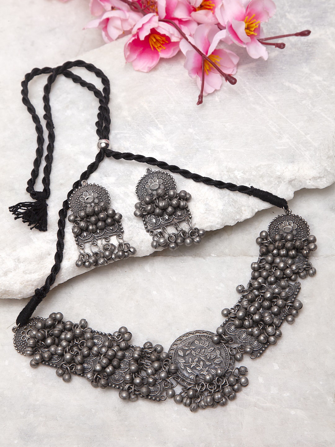 Moedbuille Women Metallic-Coloured Artificial Beads Studded Antique Tribal Jewellery Set
Moedbuille Women Metallic-Coloured Artificial Beads Studded Antique Tribal Jewellery Set