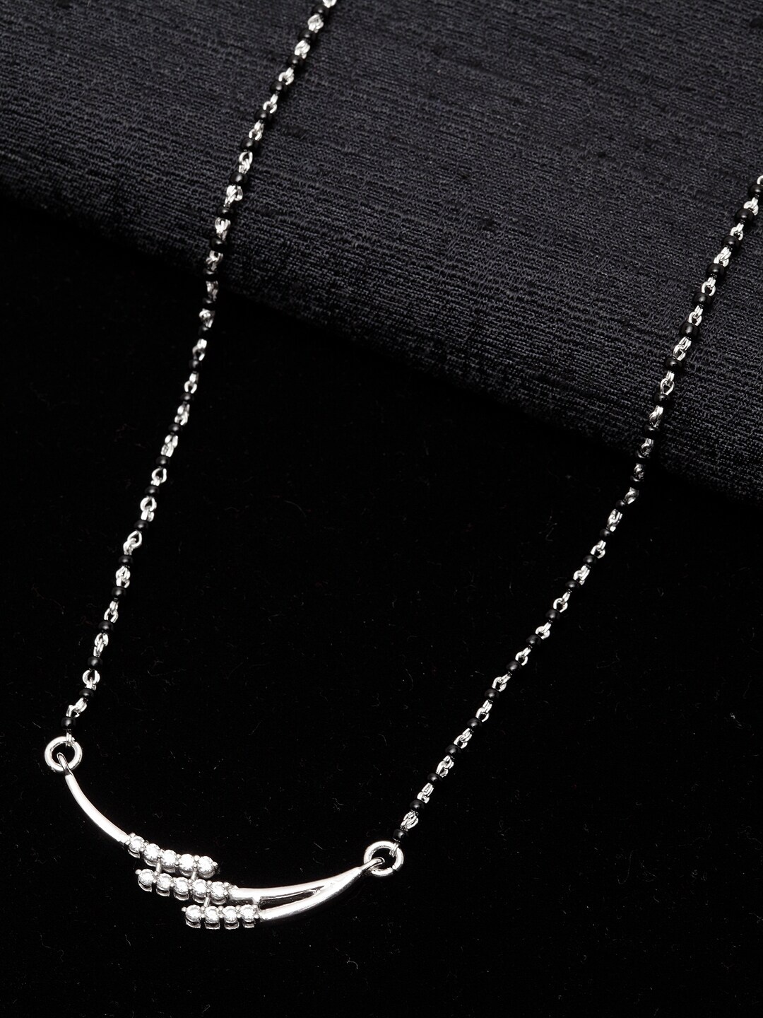 Clara 925 Sterling Silver Rhodium-Plated Black & White Zirconia-Studded Beaded Mangalsutra
Clara 925 Sterling Silver Rhodium-Plated Black & White Zirconia-Studded Beaded Mangalsutra