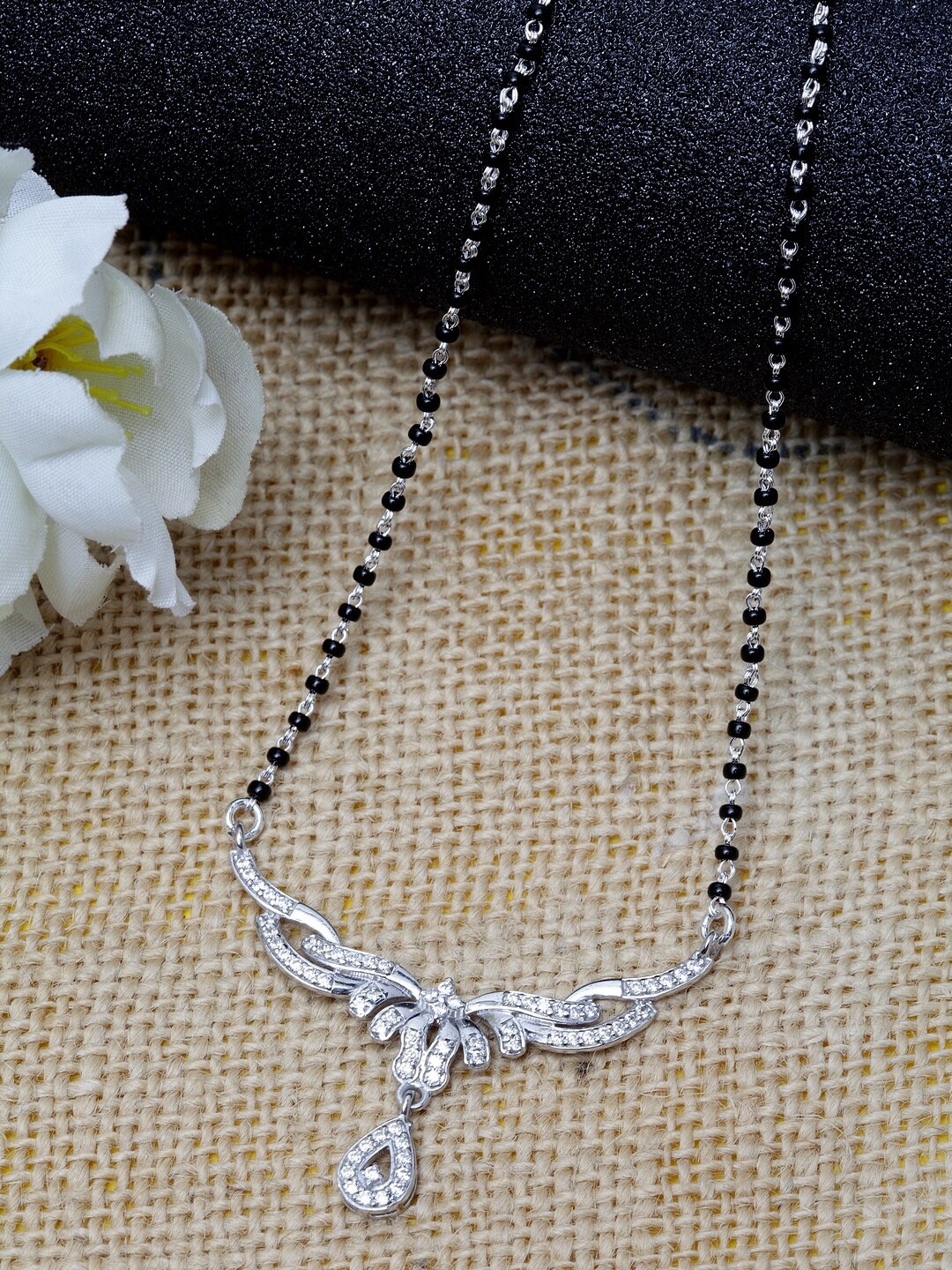 Clara 925 Sterling Silver Rhodium-Plated Black & White Zirconia-Studded Beaded Mangalsutra
Clara 925 Sterling Silver Rhodium-Plated Black & White Zirconia-Studded Beaded Mangalsutra