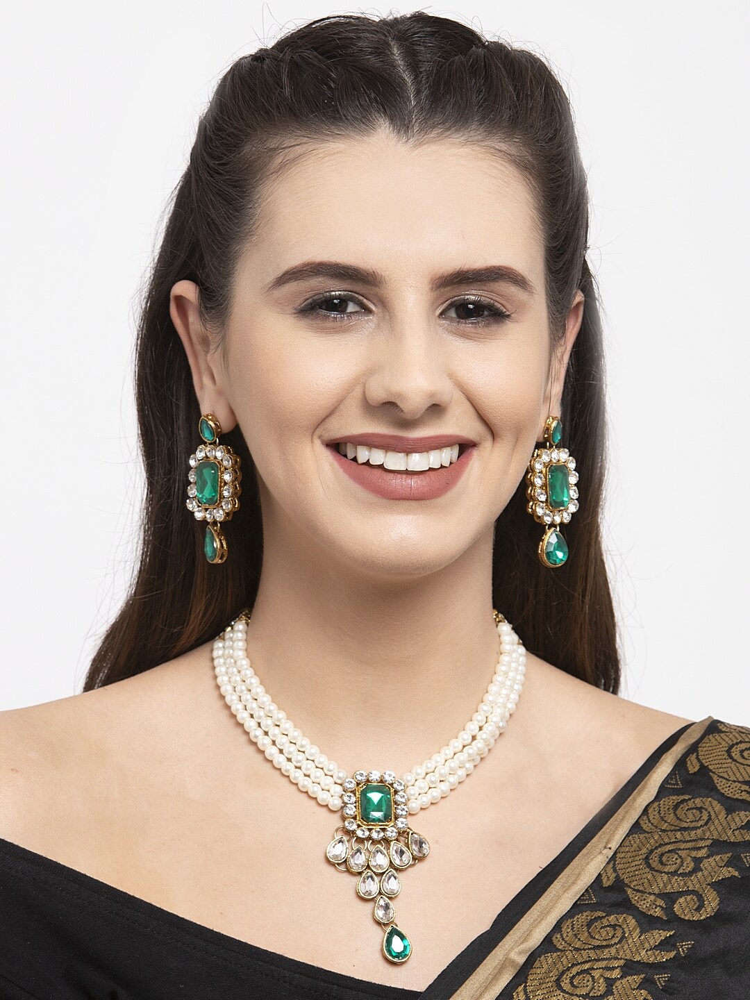 Shining Diva Gold-Plated White & Green Kundan & Artificial Stone Studded Pearl Beaded Antique Jewellery Set
Shining Diva Gold-Plated White & Green Kundan & Artificial Stone Studded Pearl Beaded Antique Jewellery Set