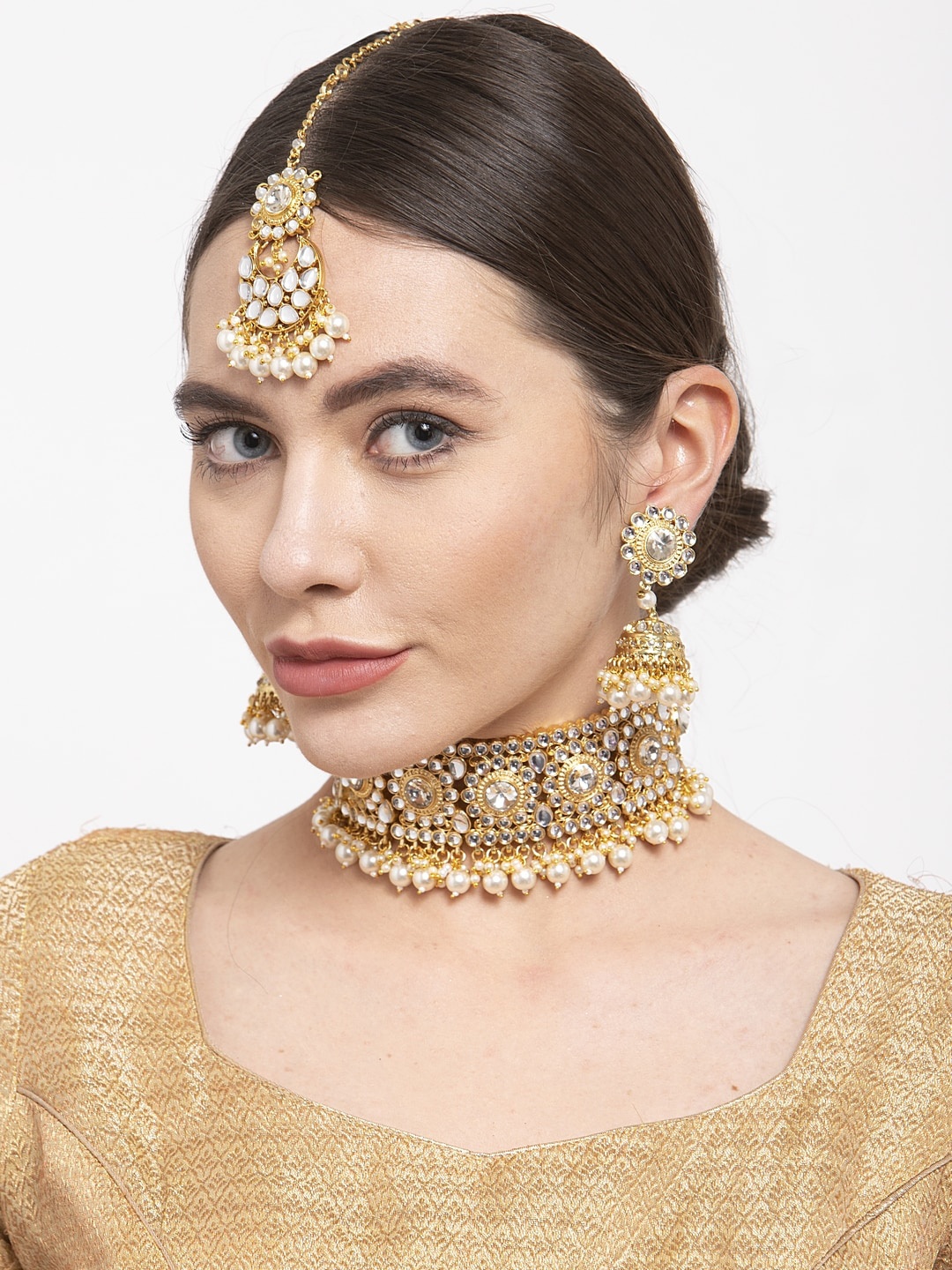 Shining Diva Women Gold-Plated White Kundan Studded Beaded Jewellery Set with Maang Tika
Shining Diva Women Gold-Plated White Kundan Studded Beaded Jewellery Set with Maang Tika