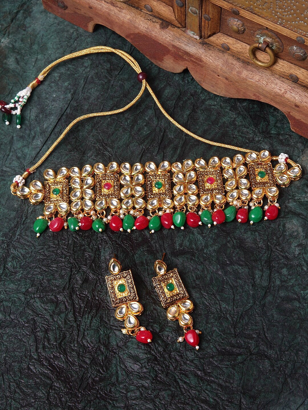 Shining Diva Gold-Plated White & Red Kundan-Studded Beaded Antique Jewellery Set
Shining Diva Gold-Plated White & Red Kundan-Studded Beaded Antique Jewellery Set
