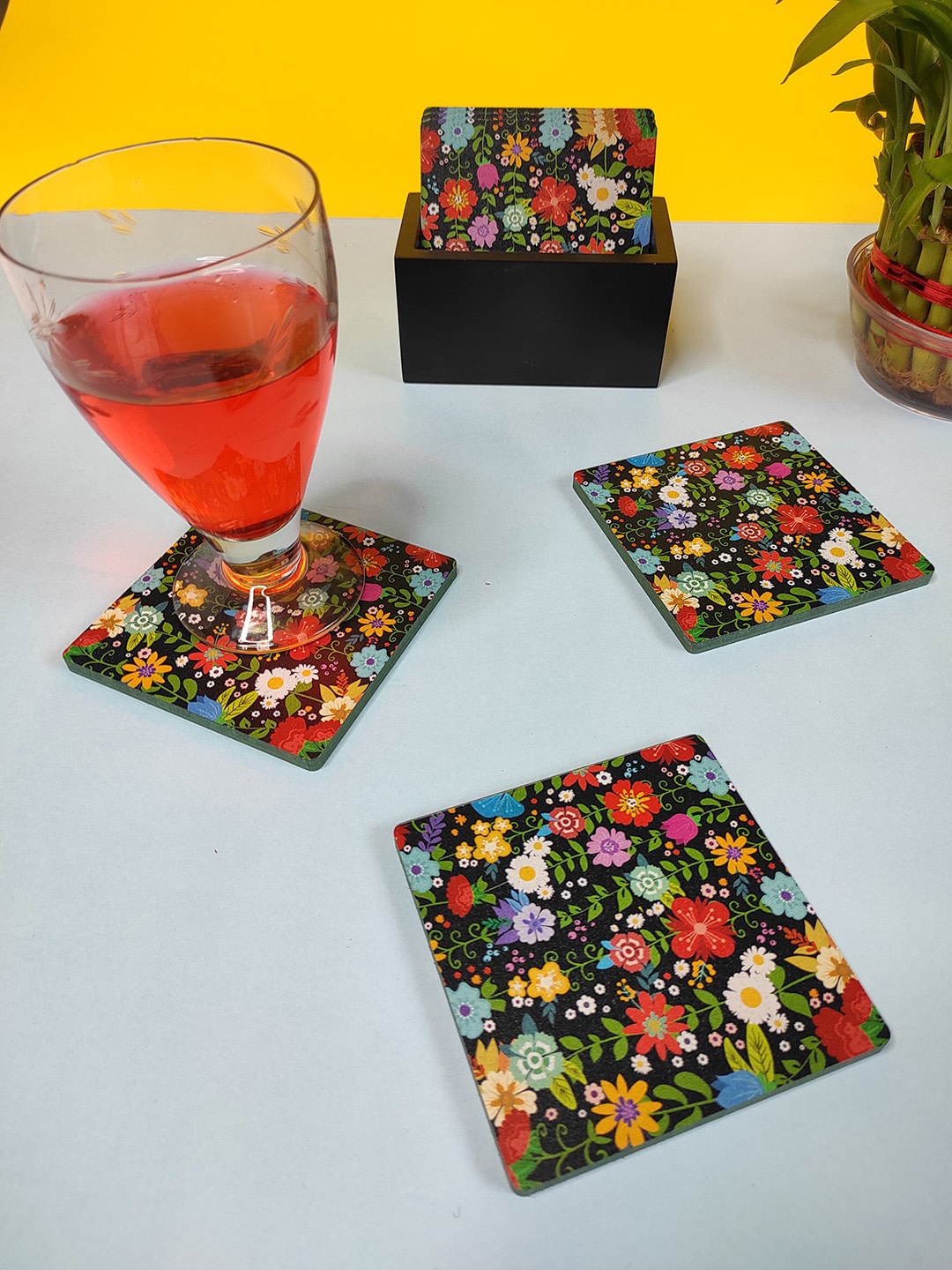 CRAYTON Set Of 6 Black & Green Floral Printed Wooden Square Coasters With Holder
CRAYTON Set Of 6 Black & Green Floral Printed Wooden Square Coasters With Holder