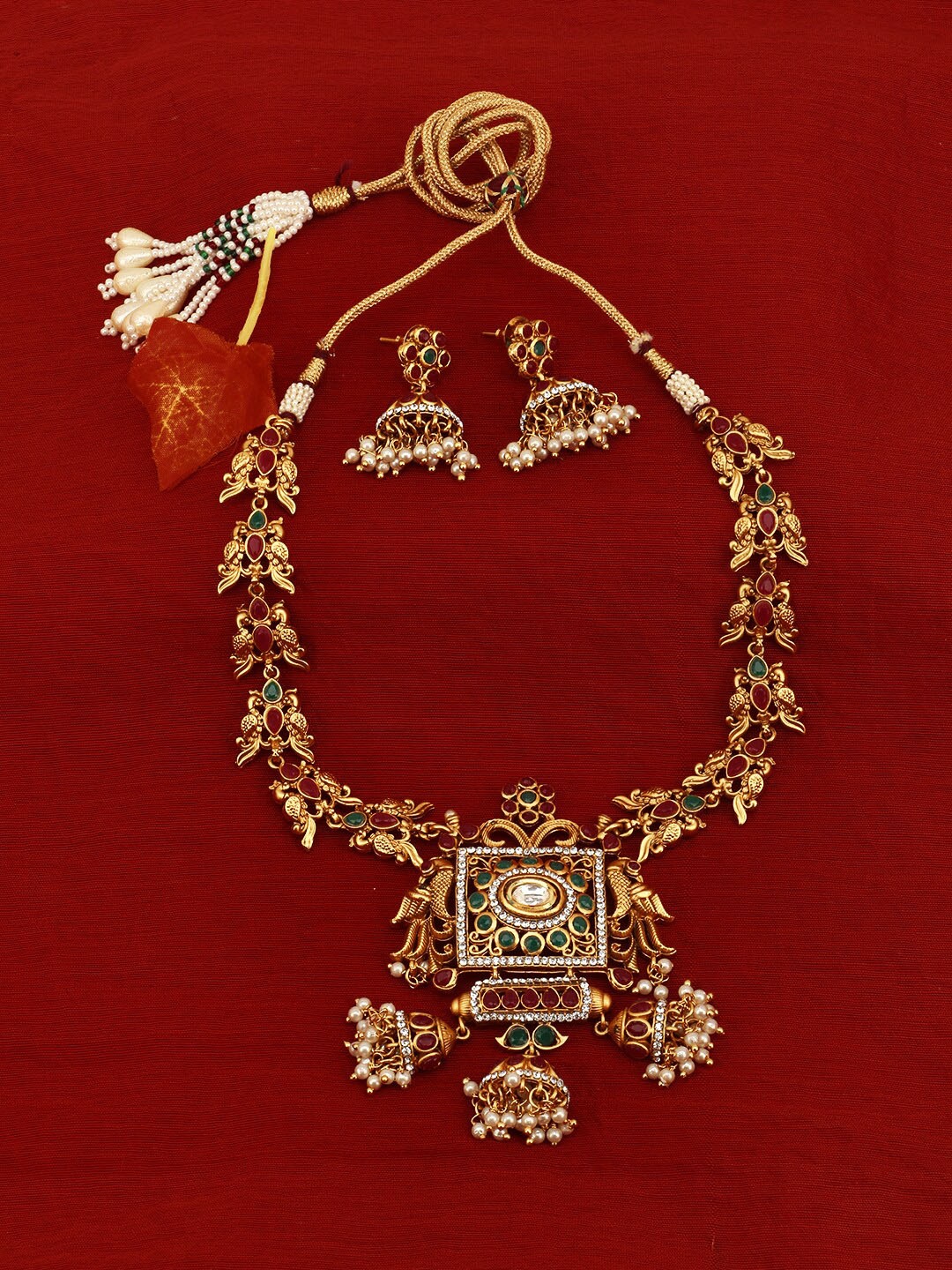 Adwitiya Collection 24 K Gold-Plated & Magenta Studded Antique Jewellery Set
Adwitiya Collection 24 K Gold-Plated & Magenta Studded Antique Jewellery Set