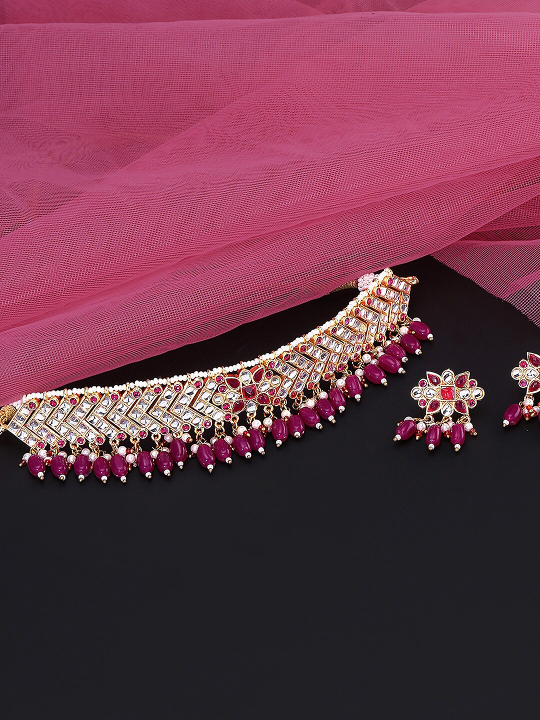 Yellow Chimes Gold-Plated Pink & White Stone-Studded Beaded Handcrafted Jewellery Set
Yellow Chimes Gold-Plated Pink & White Stone-Studded Beaded Handcrafted Jewellery Set