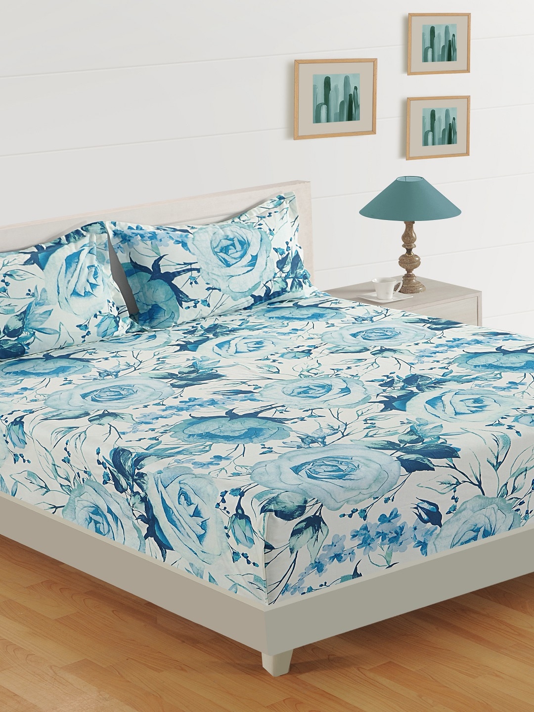 SWAYAM Unisex White & Blue Floral Flat 200 TC Cotton 1 King Bedsheet with 2 Pillow Covers
SWAYAM Unisex White & Blue Floral Flat 200 TC Cotton 1 King Bedsheet with 2 Pillow Covers